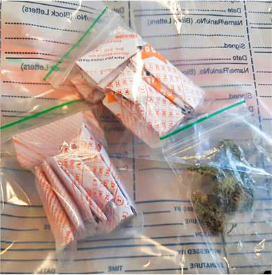 A quantity of suspected Class A and B drugs were seized. (photo from Herts police)