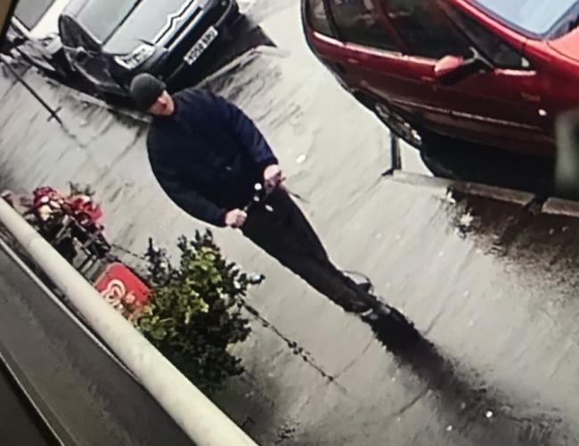 Police release image of Armed Robber at Watford Pharmacy Gunman who Threatend Staff